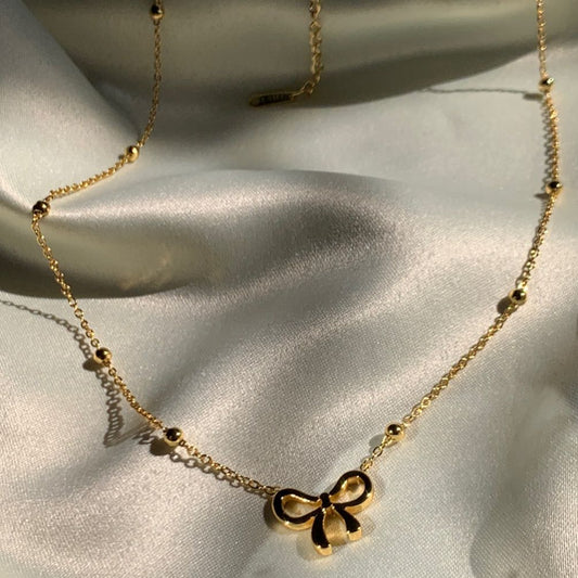 Golden Bow Pendant Necklace