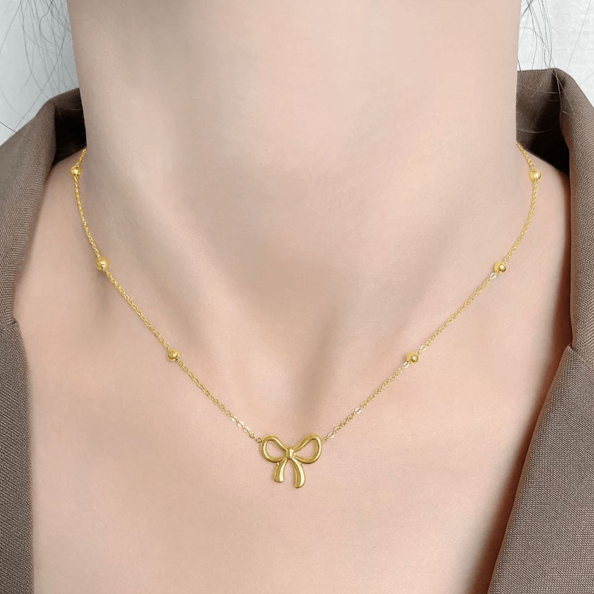 Golden Bow Pendant Necklace