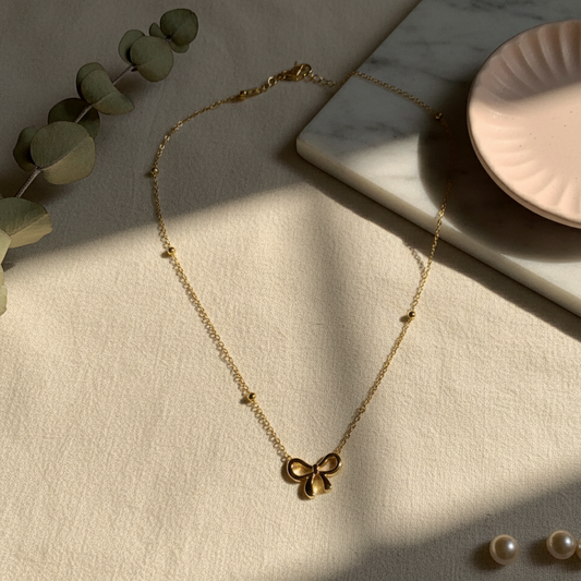 Golden Bow Pendant Necklace